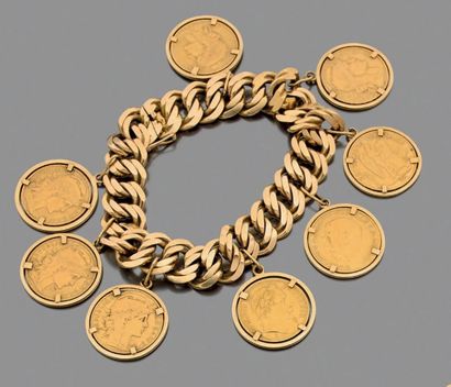 null Bracelet articulé en or jaune 750 millièmes, les maillons de forme ovale retenant...