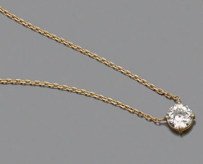 null Collier articulé en or jaune 750 millièmes retenant en pendentif un diamant...