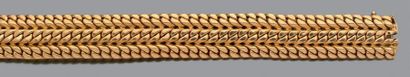 null Bracelet large et articulé en or jaune 750 millièmes à trois lignes de maillons...