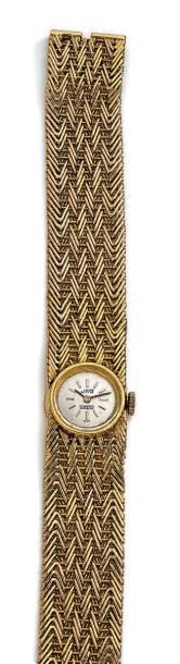 Uno 
Montre-bracelet de dame en or jaune 750 millièmes, la montre de forme ronde,...