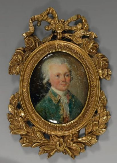 ÉCOLE FRANÇAISE du XVIIIe siècle Portrait d'homme à la veste verte Miniature. (Usures)....