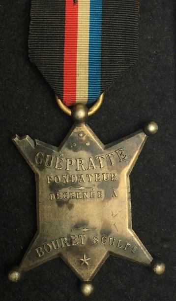null Médaille Guépratte, étoile à six branches étirées et pommetées en métal argenté...