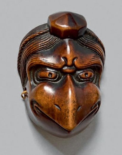 JAPON - Fin de l'époque Edo (1603-1868) Netsuke en buis, petit modèle de masque de...