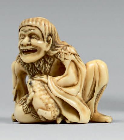 JAPON - Milieu de l'époque Edo (1603-1868) Netsuke en ivoire, Gama Sennin assis caressant...