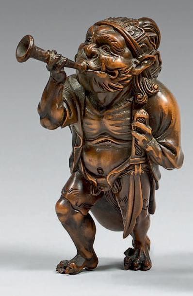 JAPON - Époque Edo (1603-1868), XIXe siècle Okimono en buis dans le style des netsuke,...