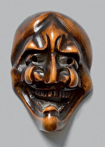 JAPON - Fin de l'époque Edo (1603-1868) Netsuke en buis, petit modèle de masque Nô,...