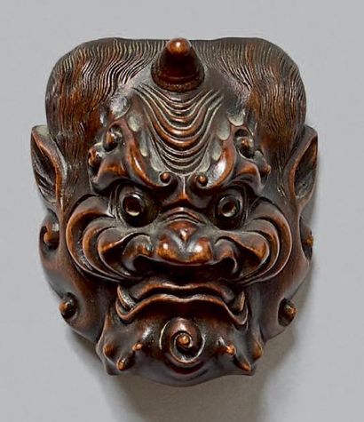 JAPON - Fin de l'époque Edo (1603-1868) Netsuke en buis, petit modèle de masque représentant
Fujin,...
