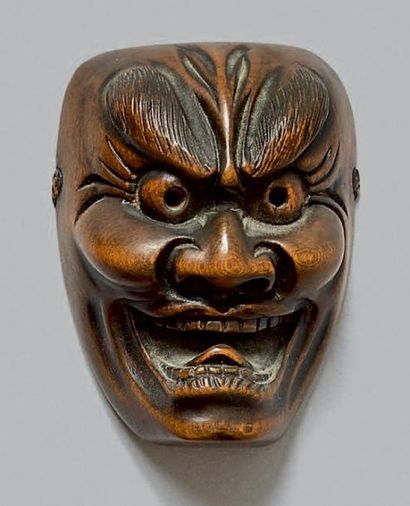 JAPON - Époque Edo (1603-1868), XIXe siècle Netsuke en bois, petit modèle de masque...