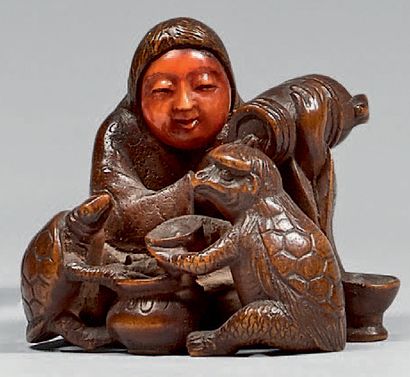 JAPON - Epoque MEIJI (1868-1912) Netsuke en bois, shojo, kappa et tortue partageant...