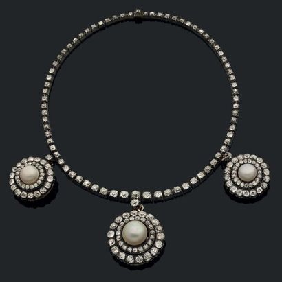 null Collier articulé en or 750 millièmes et argent 925 millièmes serti d'une ligne...