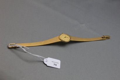 null Bracelet-montre de dame en or jaune 750 millièmes, la montre de forme ovale,...
