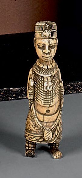 null Statuette en ivoire patiné représentant un Oni.
Bénin, XIXe-XXe siècle.
Hauteur:...