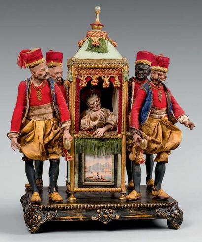 null Quatre personnages en ottoman portant un palanquin richement garni de passementerie...