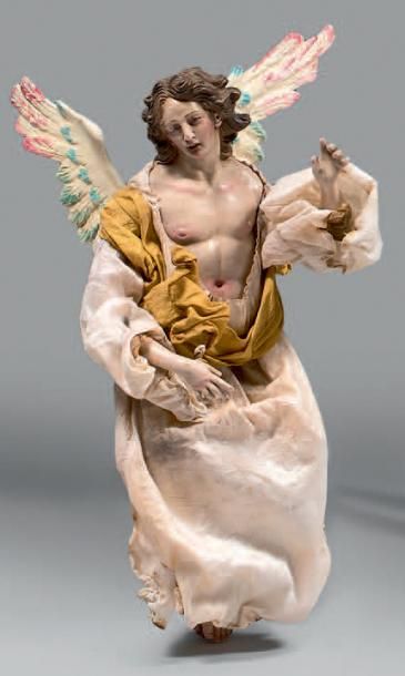 null Trois grandes statuettes d'anges dans les nuées en bois sculpté polychrome.
Deux...