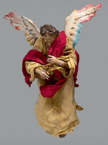 null Trois grandes statuettes d'anges dans les nuées en bois sculpté polychrome.
Deux...