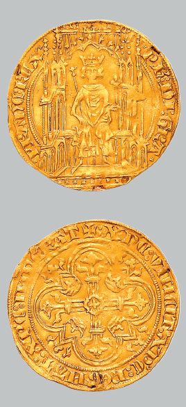 null Double d'or. 6,75 g.
Le roi assis dans une stalle gothique avec baldaquin.
R/...
