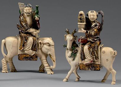 CHINE - Début du XXe siècle 
Deux statuettes en ivoire polychrome, deux immortels,...