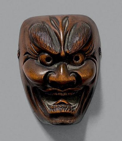 JAPON - Époque Edo (1603-1868), XIXe siècle 
Netsuke en bois, petit modèle de masque...