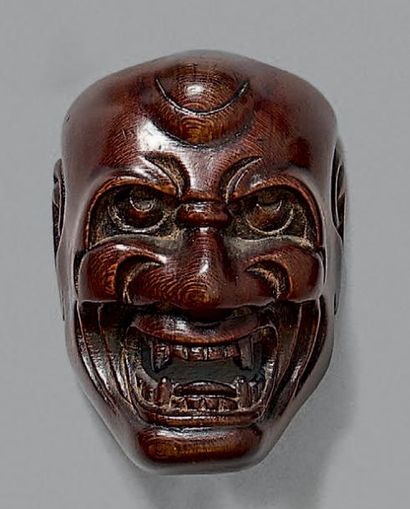 JAPON - Époque Edo (1603-1868), XIXe siècle 
Netsuke en bois, petit modèle de masque...
