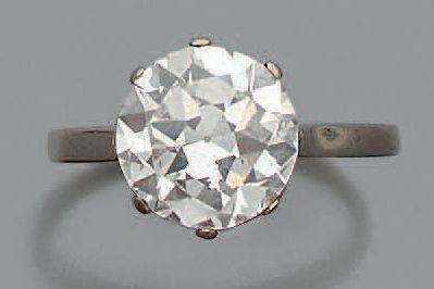 null Bague en or gris 750 millièmes ornée d'un diamant rond de taille brillant.
Poids...