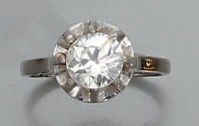 null Bague en platine 850 millièmes et or gris 750 millièmes ornée d'un diamant rond...