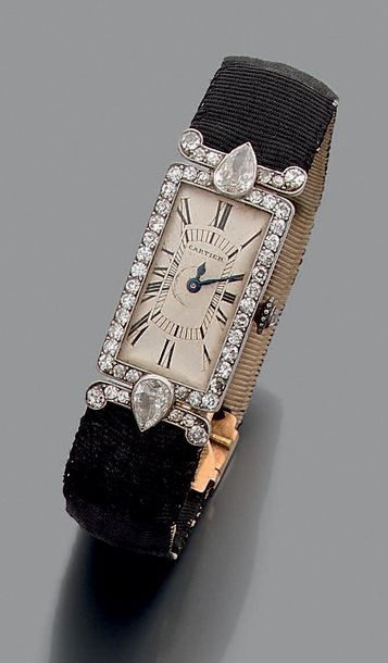 CARTIER N°20027 / 9399 / 10640.
Montre-bracelet de dame Art Déco en platine et diamants....