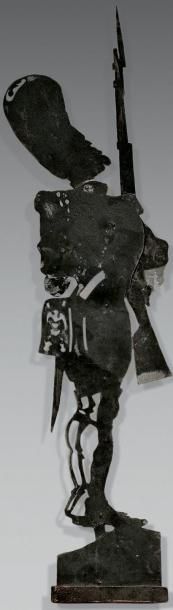 CARAN D'ACHE (1858-1901) Silhouette découpée articulée en zinc laqué noir figurant...