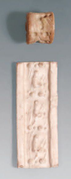 null CYLINDRE marbre rose. Uruk, 3500-2800 Hauteur : 1,7 cm
