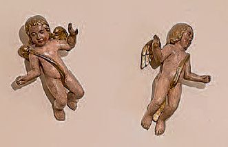 null Paire d'angelots en bois sculpté argenté et doré.
Italie, XVIIIe/XIXe siècle.
Hauteur:...