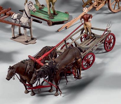 null Lot de quatre charrettes miniatures dont trois attelées et deux chevaux en bois...