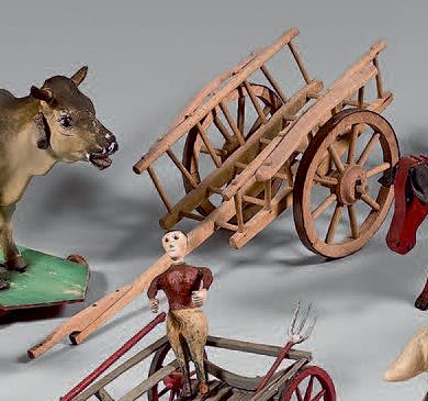 null Lot de quatre charrettes miniatures dont trois attelées et deux chevaux en bois...
