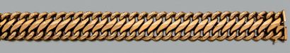 null Bracelet articulé en or jaune 750 millièmes, les maillons en forme de huit unis...
