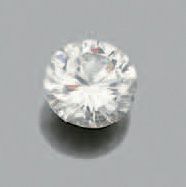 null Diamant sur papier de forme ronde et de taille brillant, accompagné d'un pli...