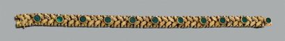null Bracelet articulé en or jaune 750 millièmes tressé et partiellement gravé serti...