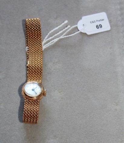 LIP. Montre-bracelet de dame en or jaune 750 millièmes, la montre de forme ronde,...