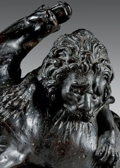 null Statuette en bronze à patine brune représentant un lion attaquant un cheval.
(Défauts...