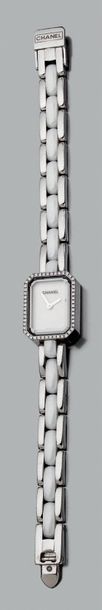 Chanel, signé et numéroté Modèle «Première mini».
Montre-bracelet de dame en acier...