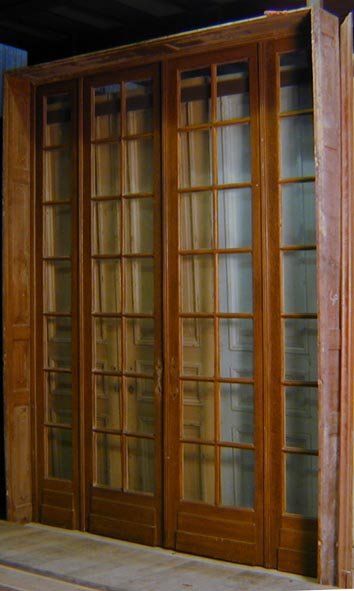 null Passage vitré peint en faux bois à deux dormants et ouvrant à deux portes avec...