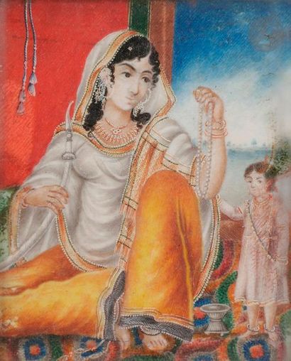 null Un raja et une jeune femme fumant le narghilé, Inde, période raj, fin XIXe siècle...
