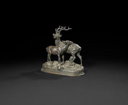  Alfred Dubucand (1828-1894) Cerf et biche en accolade Bronze à patine brune. Empoussièrement,...