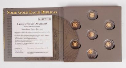 null 7 pièces en or (585/1000) "Solid Gold Eagle Replicas" dans un coffret 
Diametre...