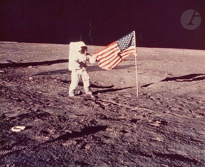 null NASA - Alan BeanApollo 12, November 19, 1969. 
Charles Conrad holding the American...