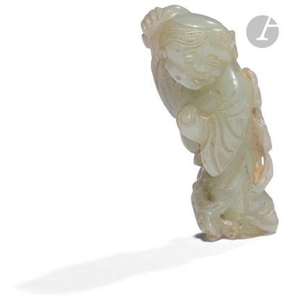  CHINE - Vers 1900 Petite statuette en néphrite de Liu Hai tenant des sapèques. H....