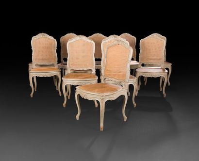 null Suite de douze chaises cannées en bois peint à dossier plat et décor de feuillages...