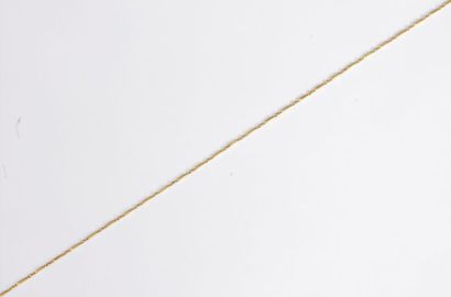 null Collier en or 18K (750), articulé de maillons batonnets. Poids : 20,8 g