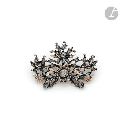 null Cut silver pendant brooch drawing foliage set with table-cut diamonds, centered...