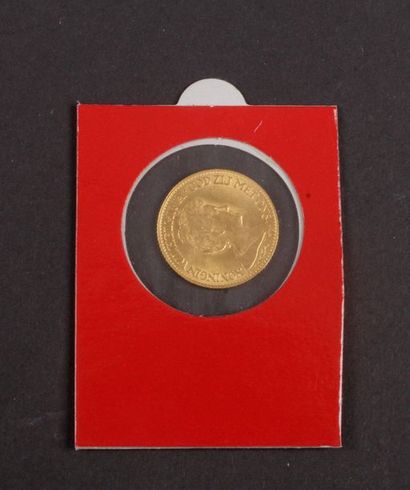 null Lot de 2 pièces en or étrangères :
- 20 Pesos en or. 1959
- 10 Gulden en or....