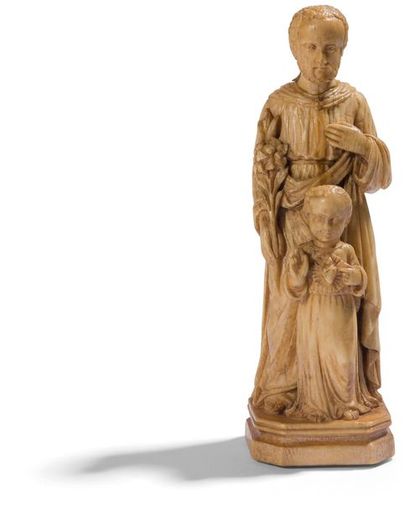 null Saint Joseph et l’Enfant Jésus en ivoire sculpté en ronde-bosse. Debout, Joseph...