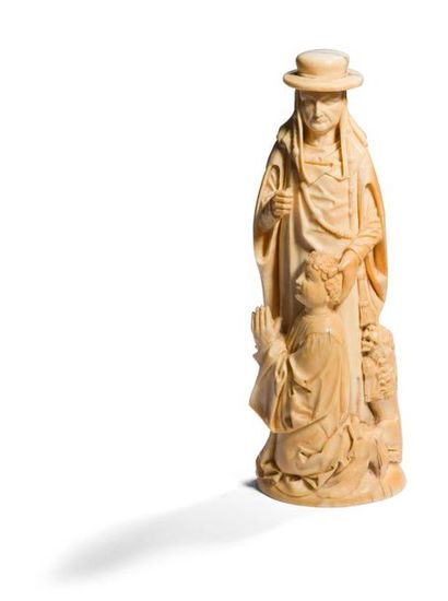 null Saint Jerome with an ivory donor carved in the round. Standing, the holy hermit...