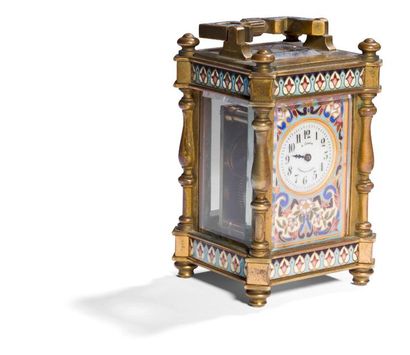 null Miniature clock in brass and painted enamels with polychrome oriental decoration,...